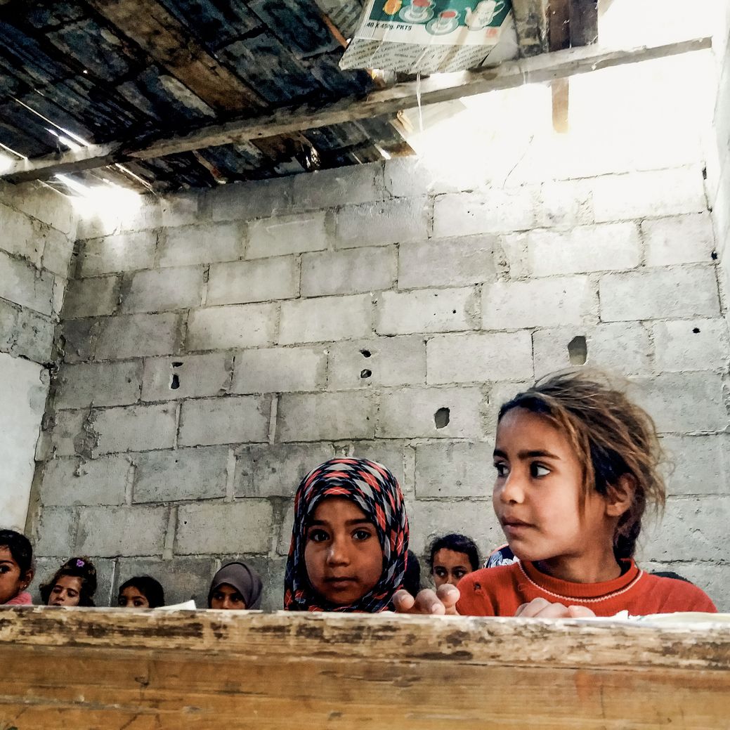 Photo by Salem Mdlala. A group of girls hiding in Ghouta.