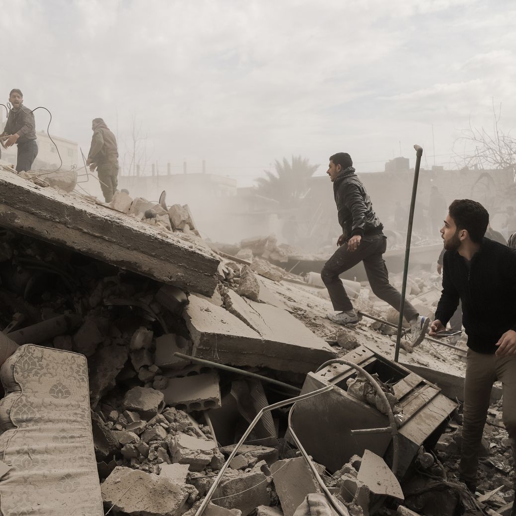 Photo by Salem Mdlala. People in the rubble inside besieged Ghouta, Syria. 