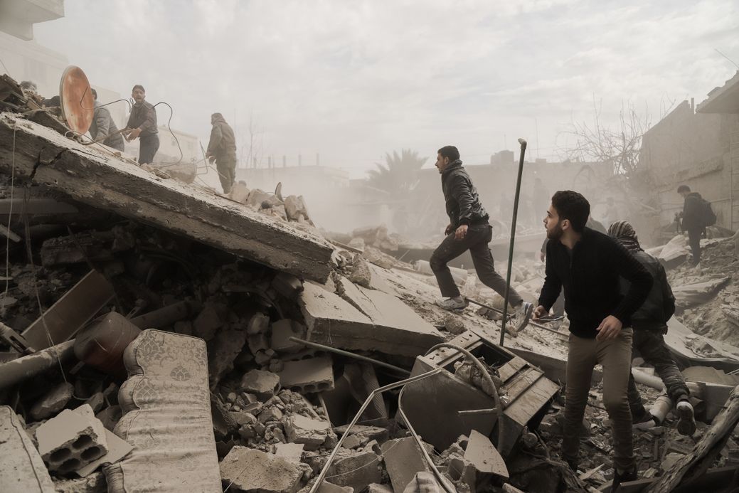 Photo by Salem Mdlala. People in the rubble inside besieged Ghouta, Syria. 