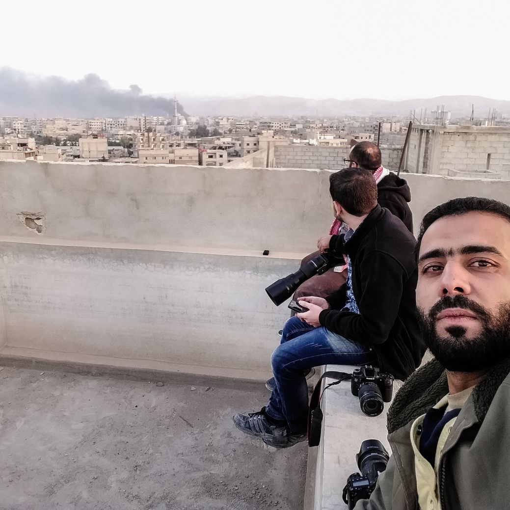 Salem Mdlala and fellow photographers in Ghouta. 